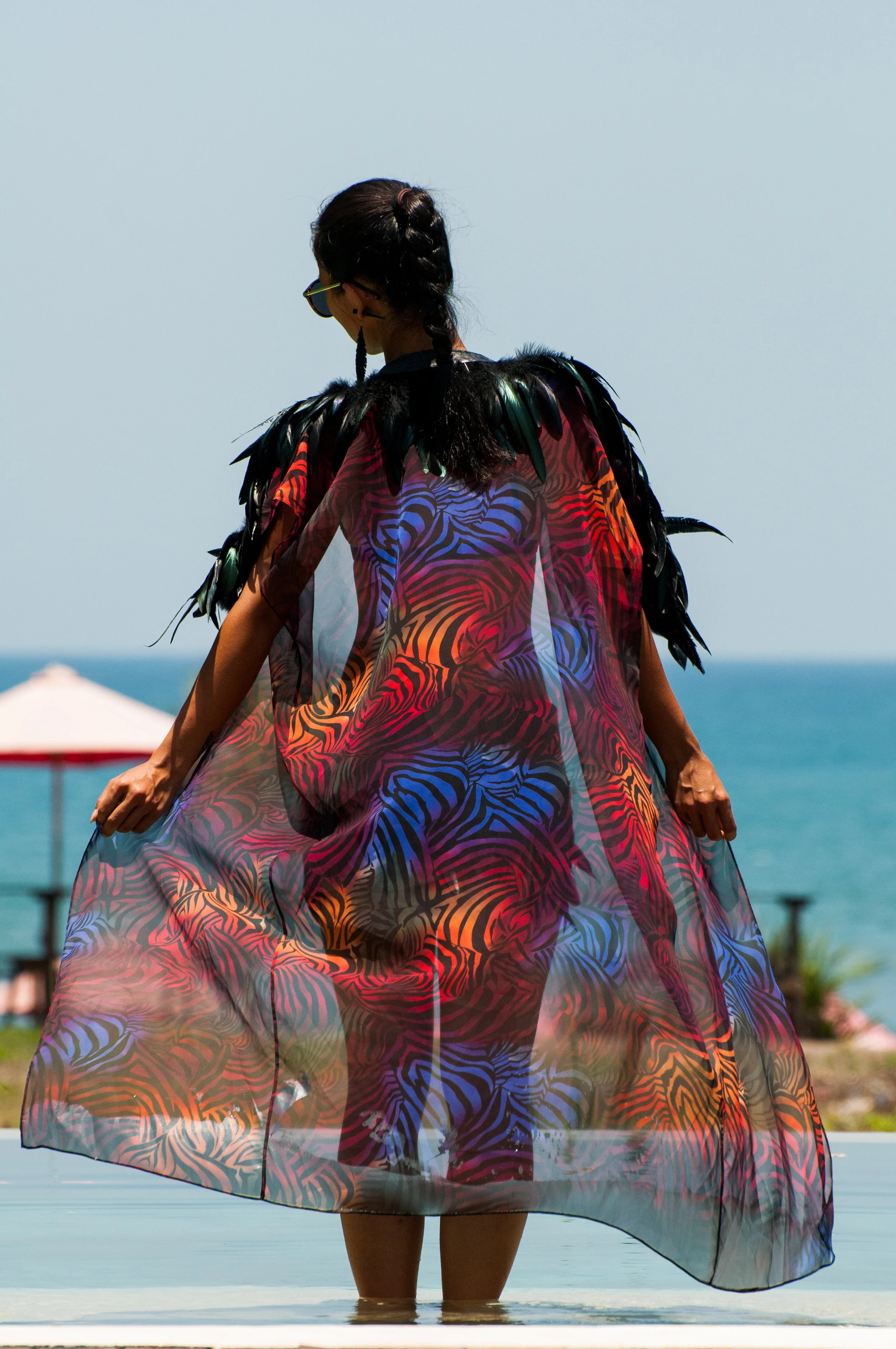 Sheer rainbow zebra festival kimono with black feathers and leather trim