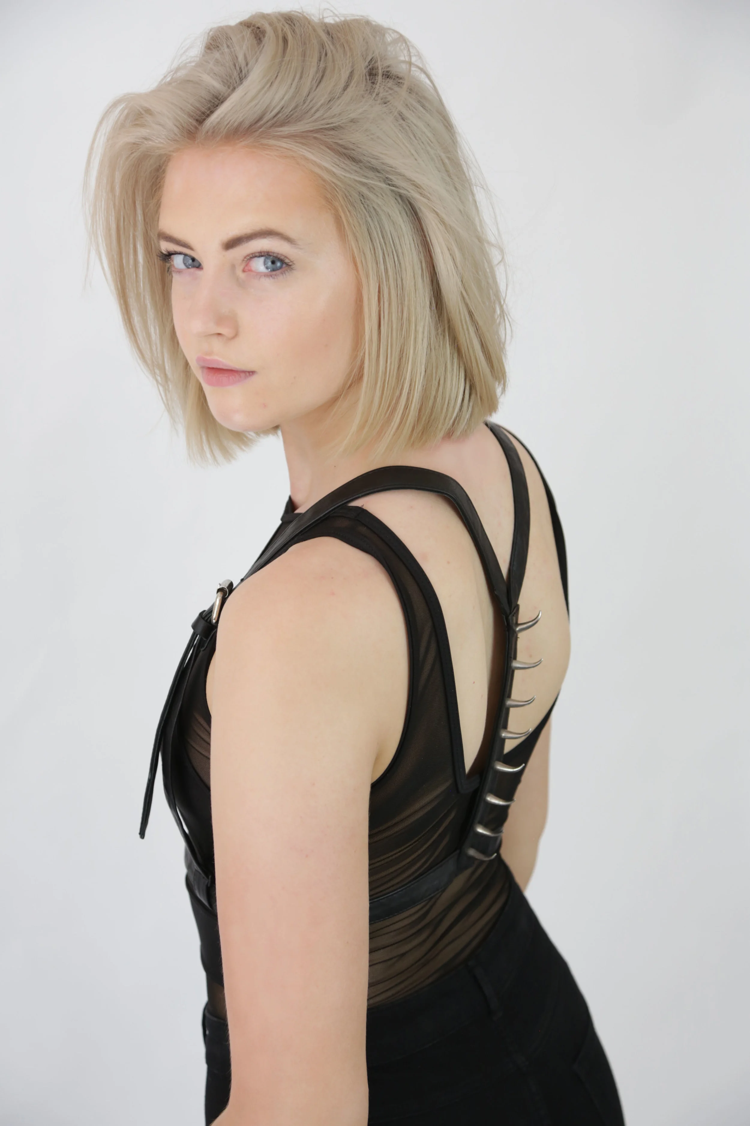 black lambskin leather harness with silver hook spikes for burning man