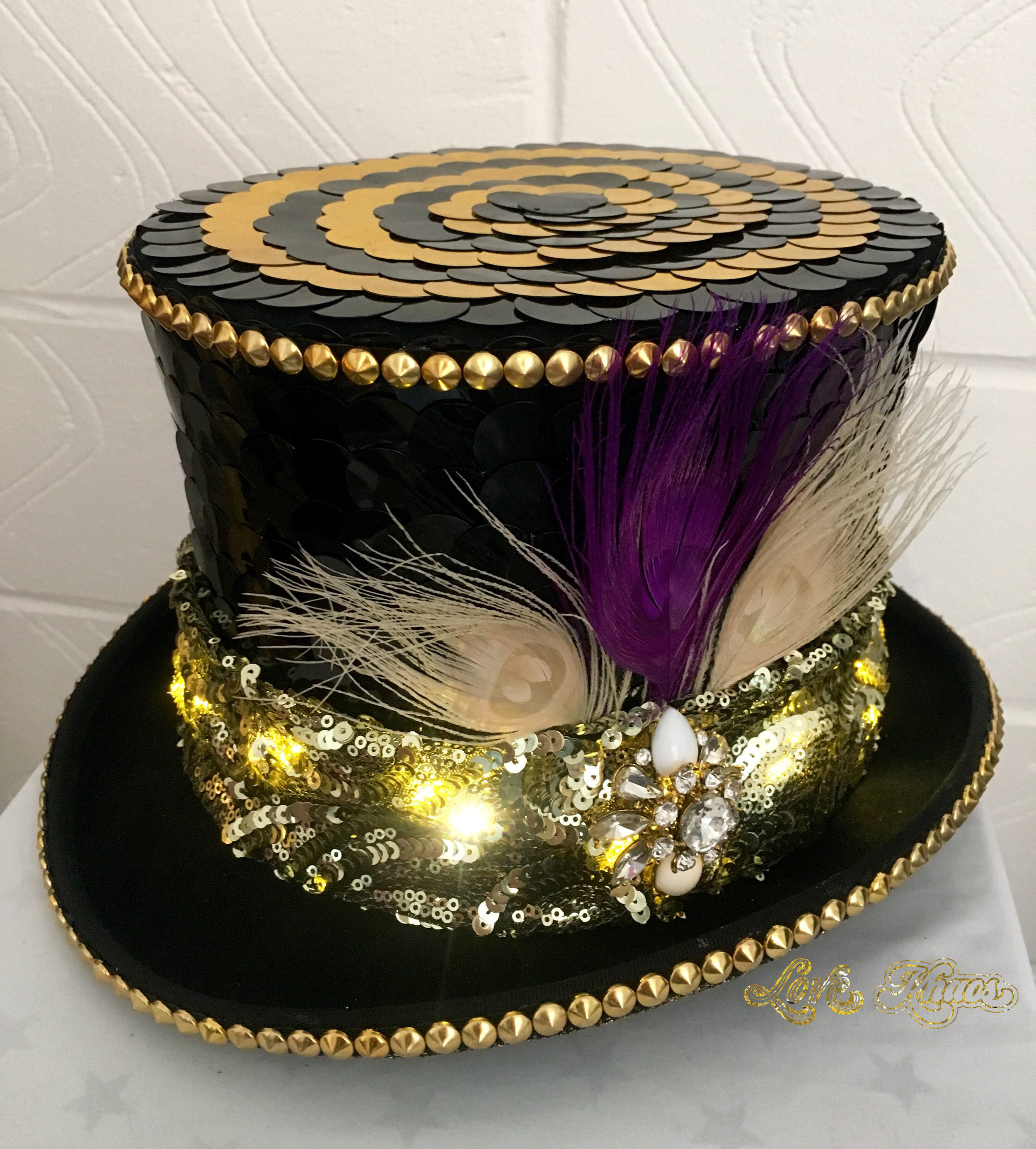 Black and Gold sequin festival top hat with led lights and feathers