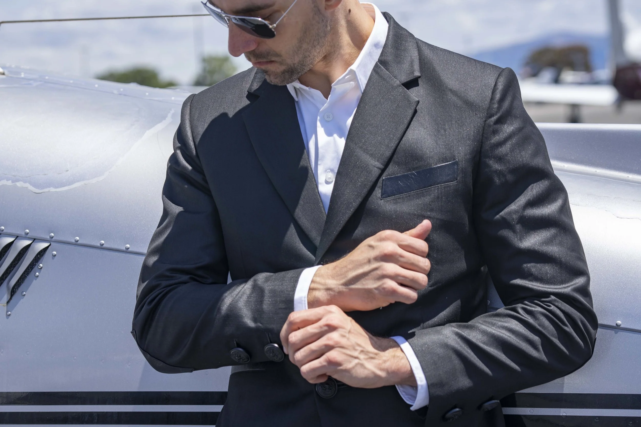 Mens corporate goth style black blazer with leather elbow pads and big skull buttons