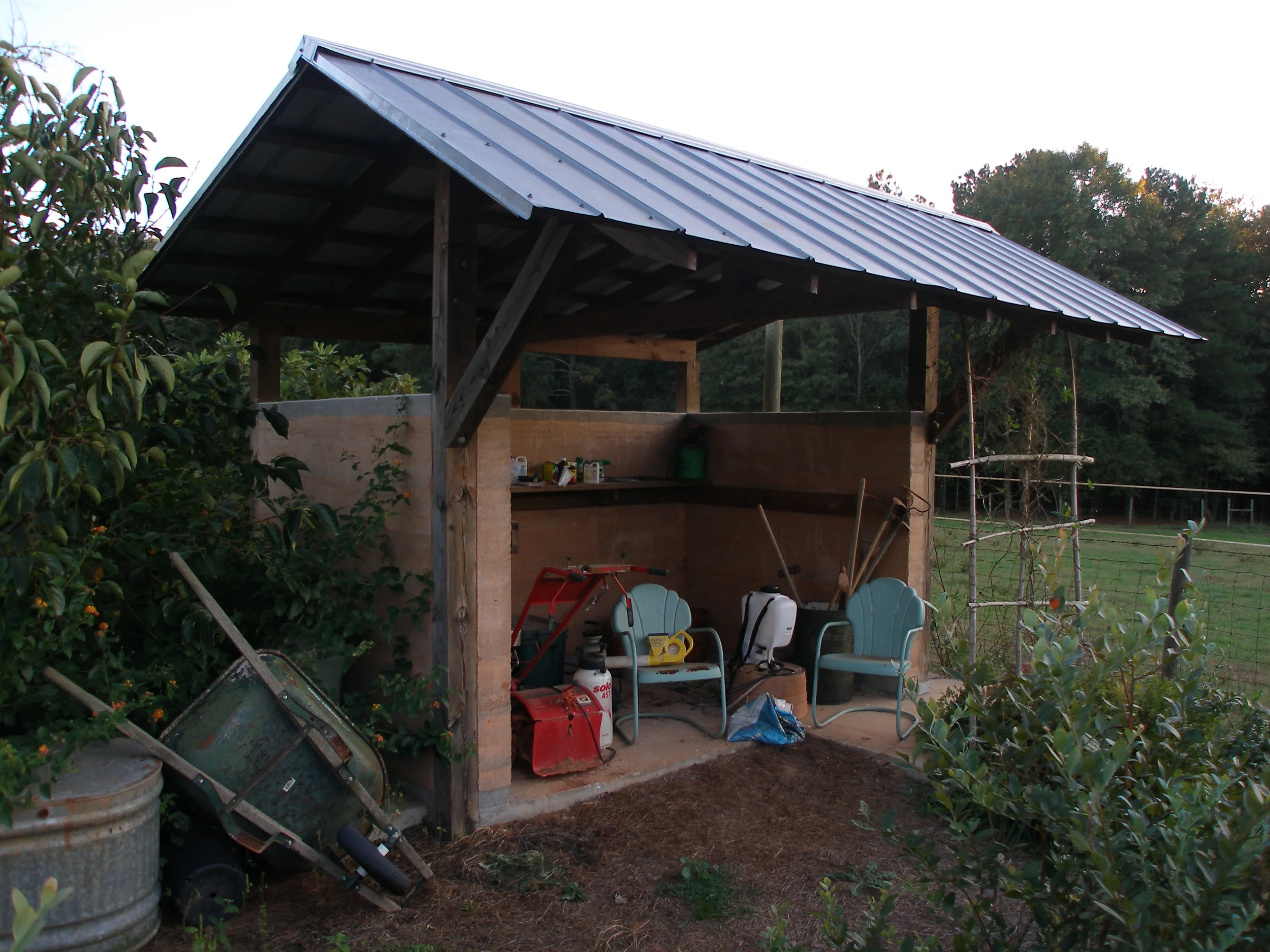 Rammed earth garden shed.