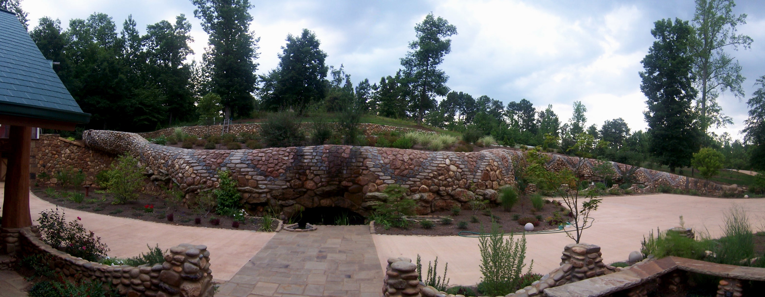 Serpentine retaining wall from courtyard.