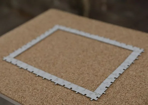 Interregnum n.1 , laser cut puzzle bricks, cork and wood, by Sogol Mabadi, 2018 / Photo Credit: Iman Tajik