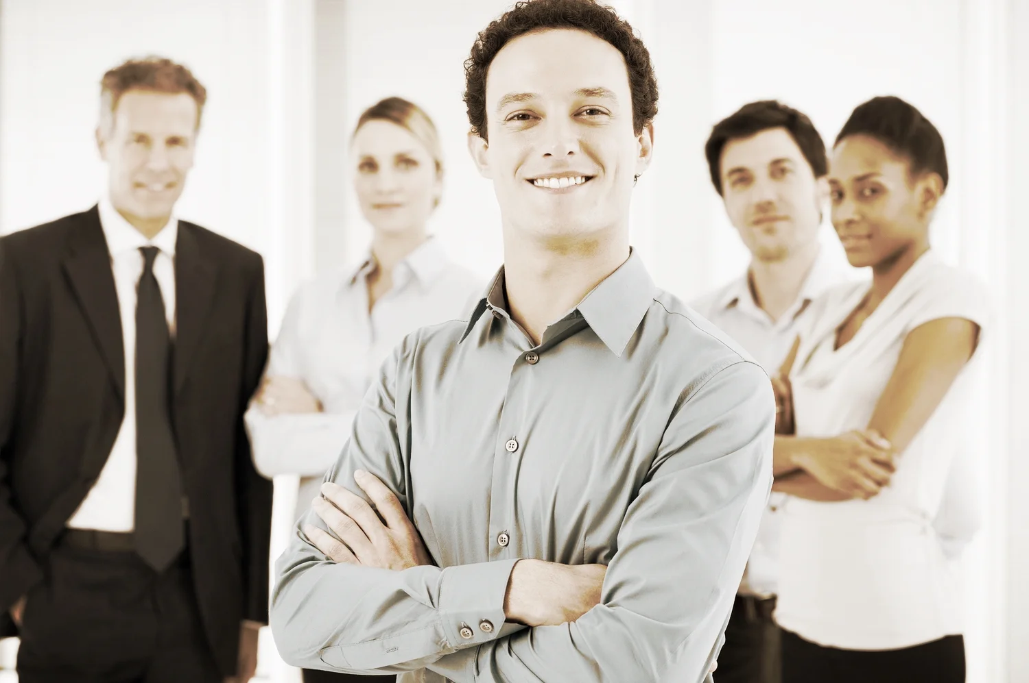 bigstock-Smiling-Businessman-With-Cross-62954746.jpg