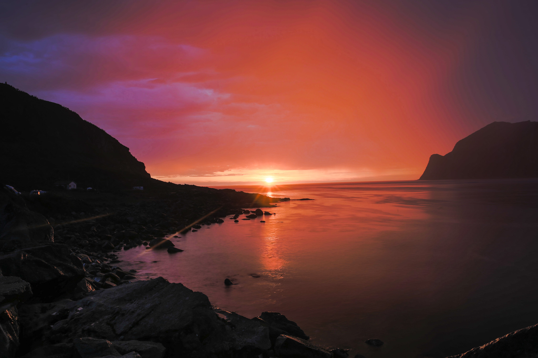 Taken from the seawall : HDR image of the midnight sun during some light showers. 