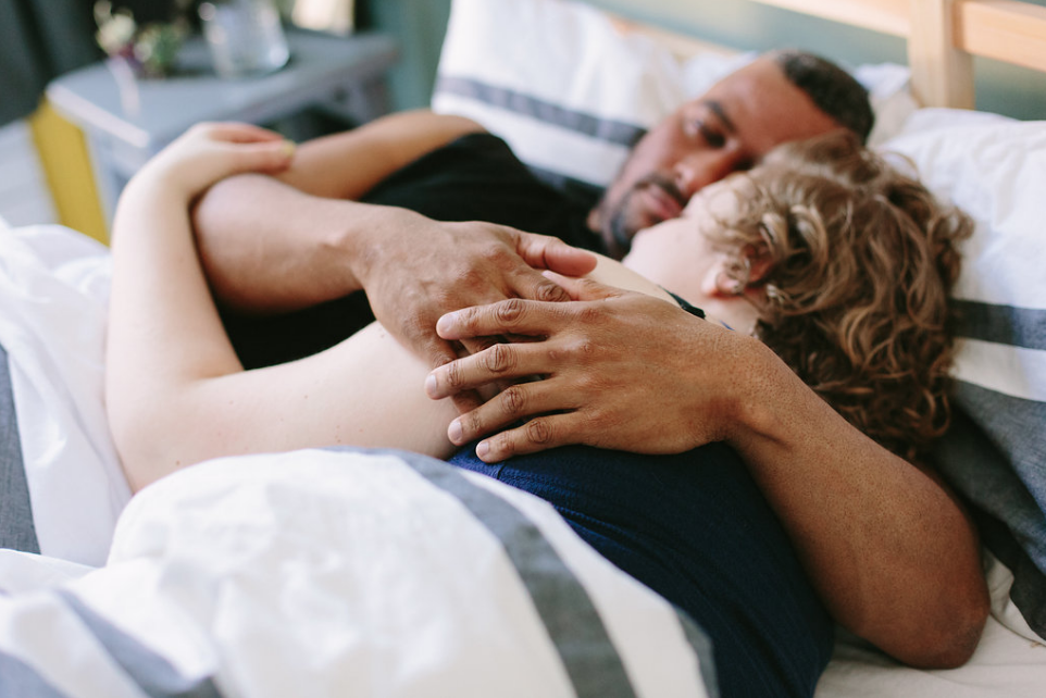 City Love Photography couple cuddling in bed