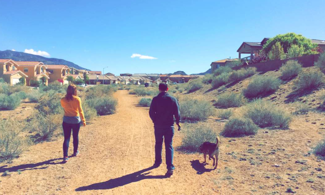 Adam Susong Walking in housing development in desert