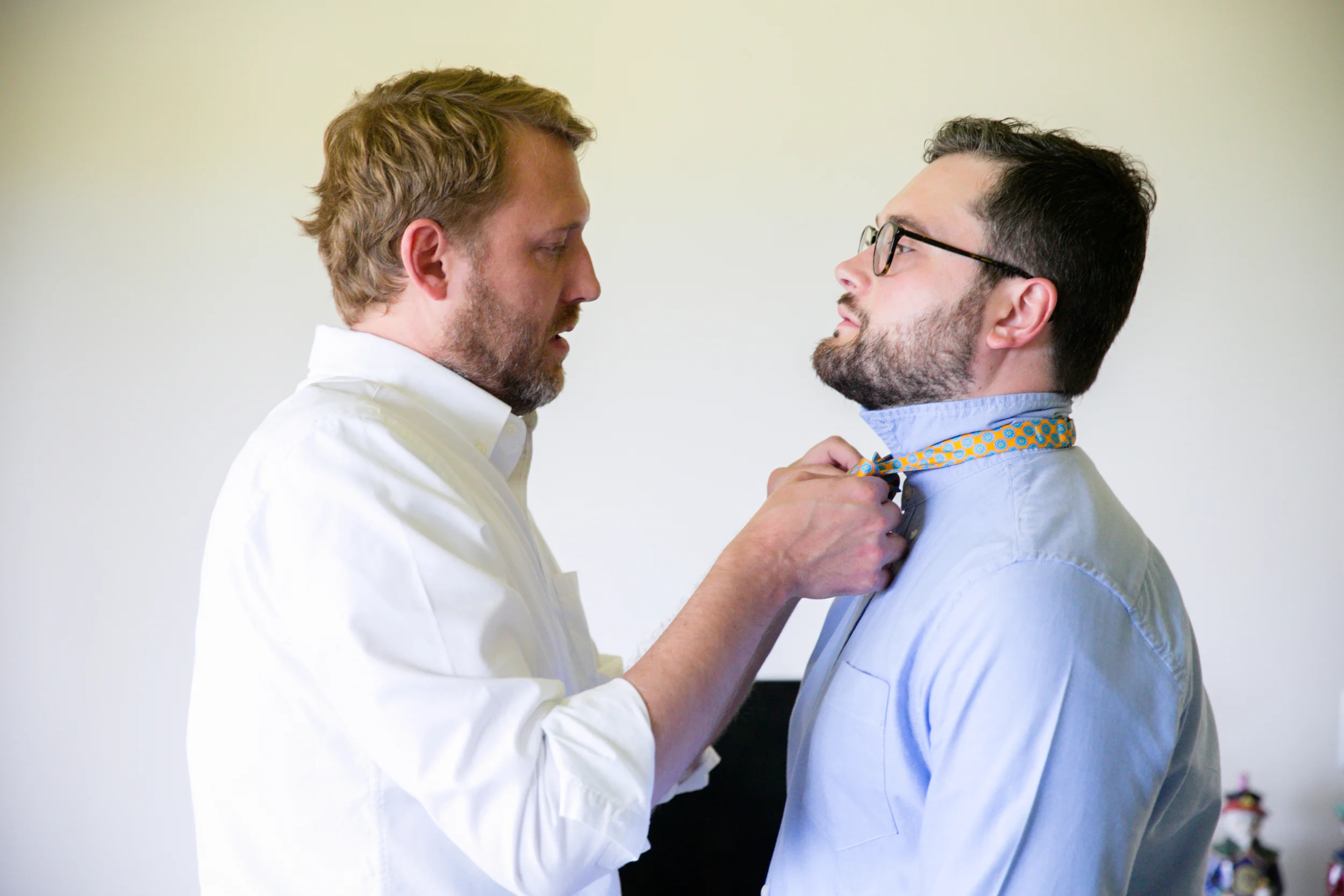 Lisa25 Wedding Photography groom tying fiancé's tie
