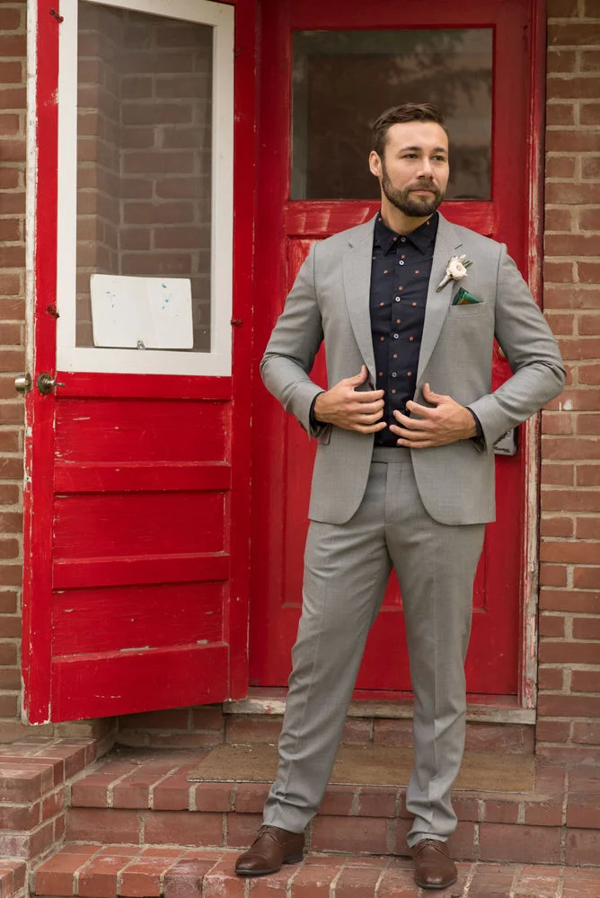 Buffy Goodman Wedding Photography man adjusting jacket
