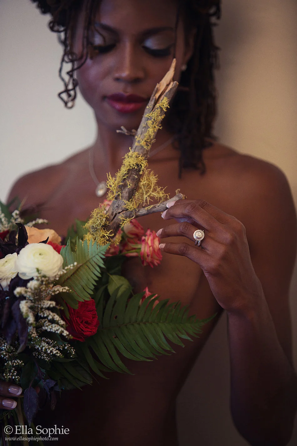 Model admiring flowers