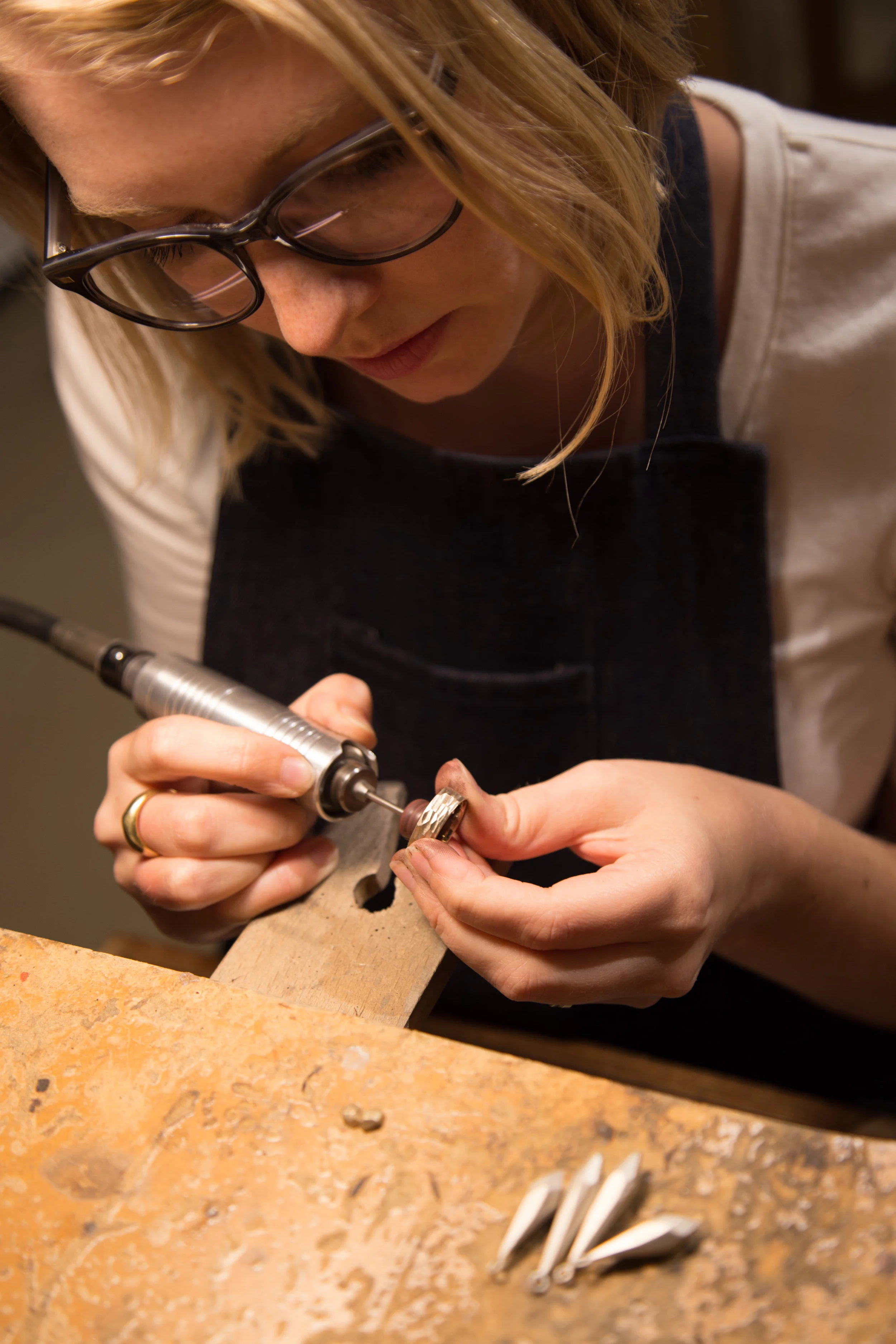 Kendra Renee is an Oakland, California metalsmith and jeweler who creates stunning ready to wear and custom pieces, including striking necklaces and earrings, as we as engagement rings and wedding bands