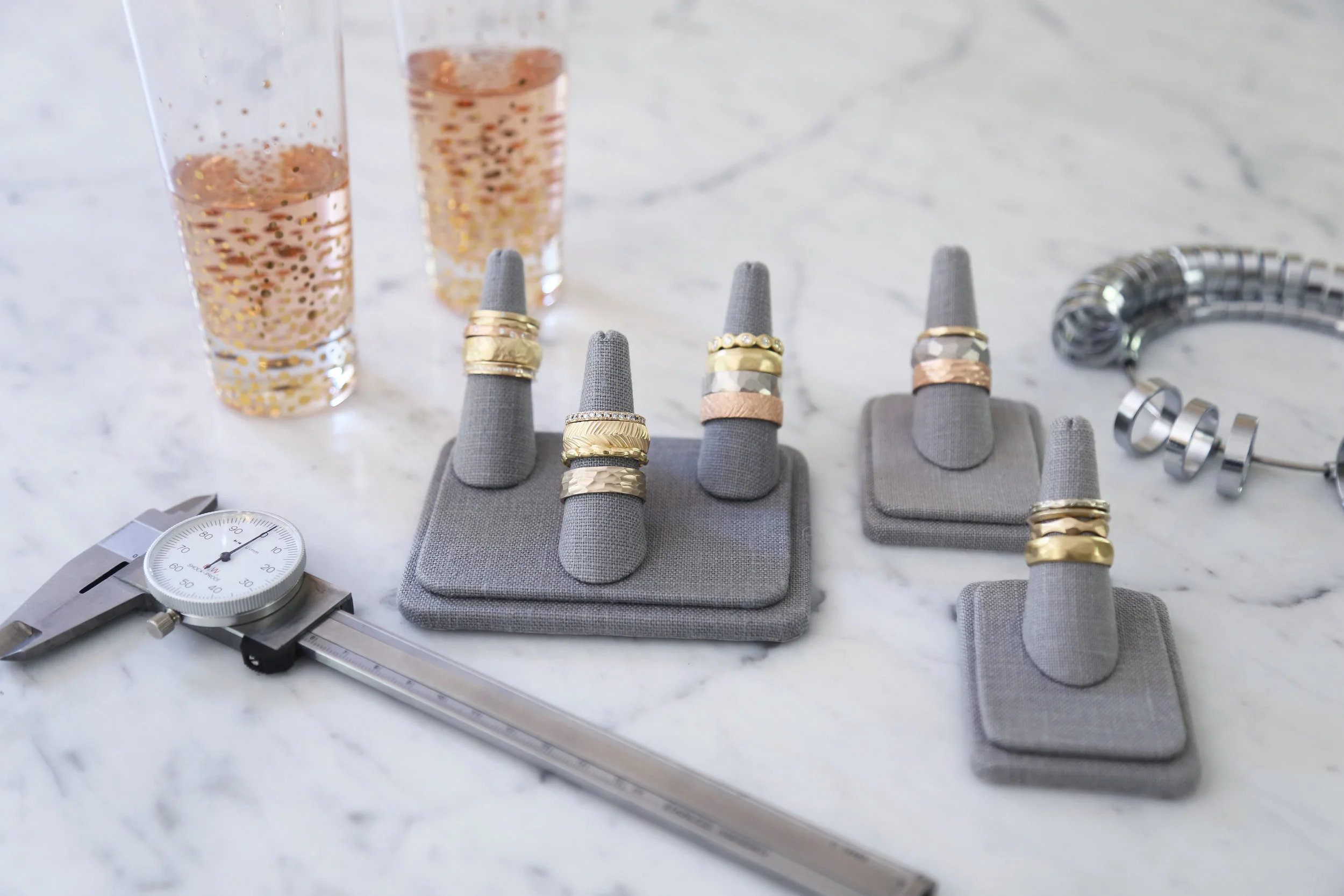 Kendra Renee is an Oakland, California metalsmith and jeweler who creates stunning ready to wear and custom pieces, including striking necklaces and earrings, as we as engagement rings and wedding bands