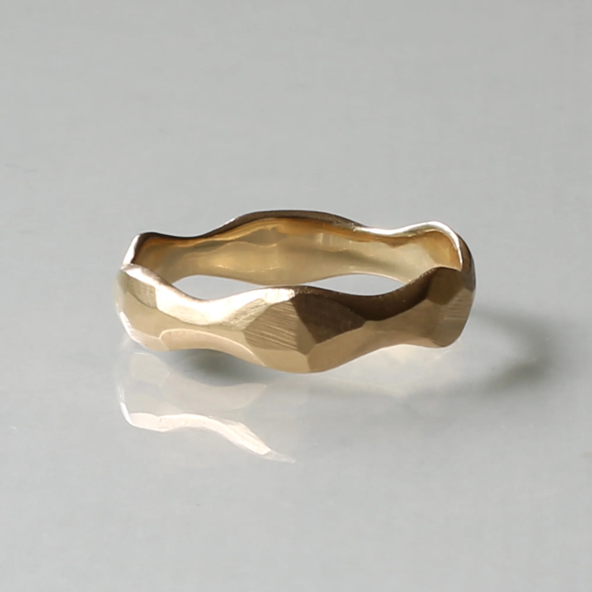 Kendra Renee is an Oakland, California metalsmith and jeweler who creates stunning ready to wear and custom pieces, including striking necklaces and earrings, as we as engagement rings and wedding bands