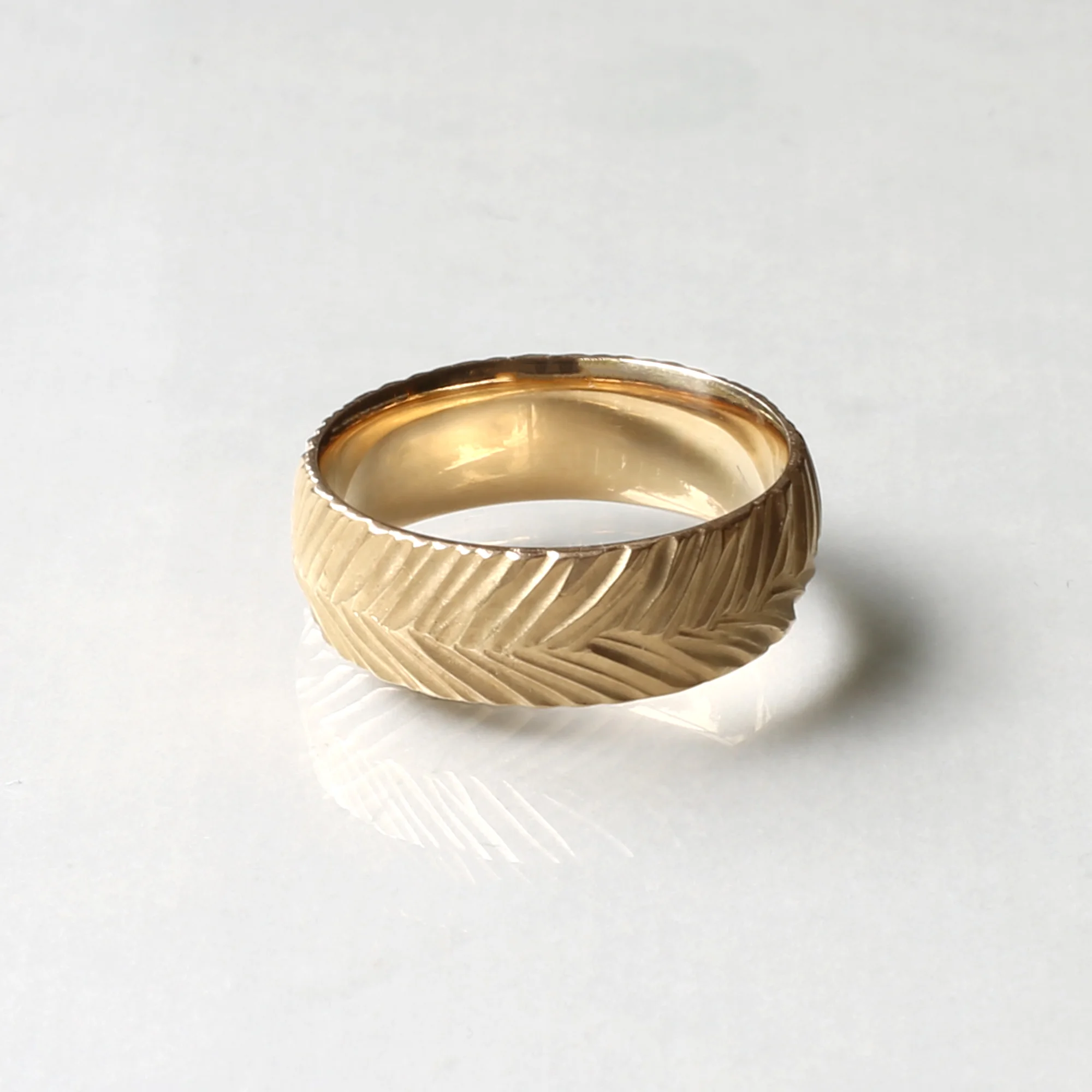 Kendra Renee is an Oakland, California metalsmith and jeweler who creates stunning ready to wear and custom pieces, including striking necklaces and earrings, as we as engagement rings and wedding bands