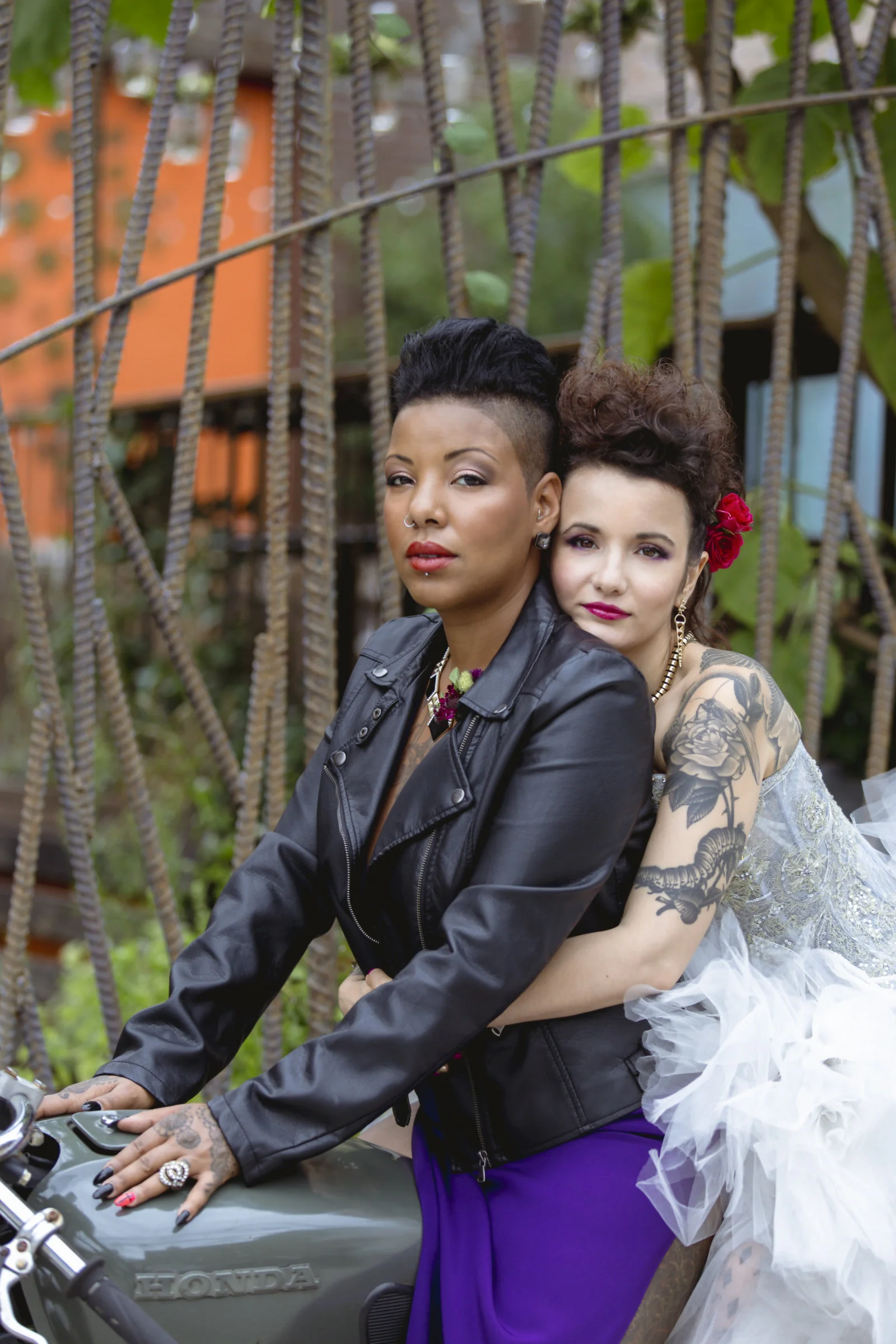 Two brides on a motorcycle