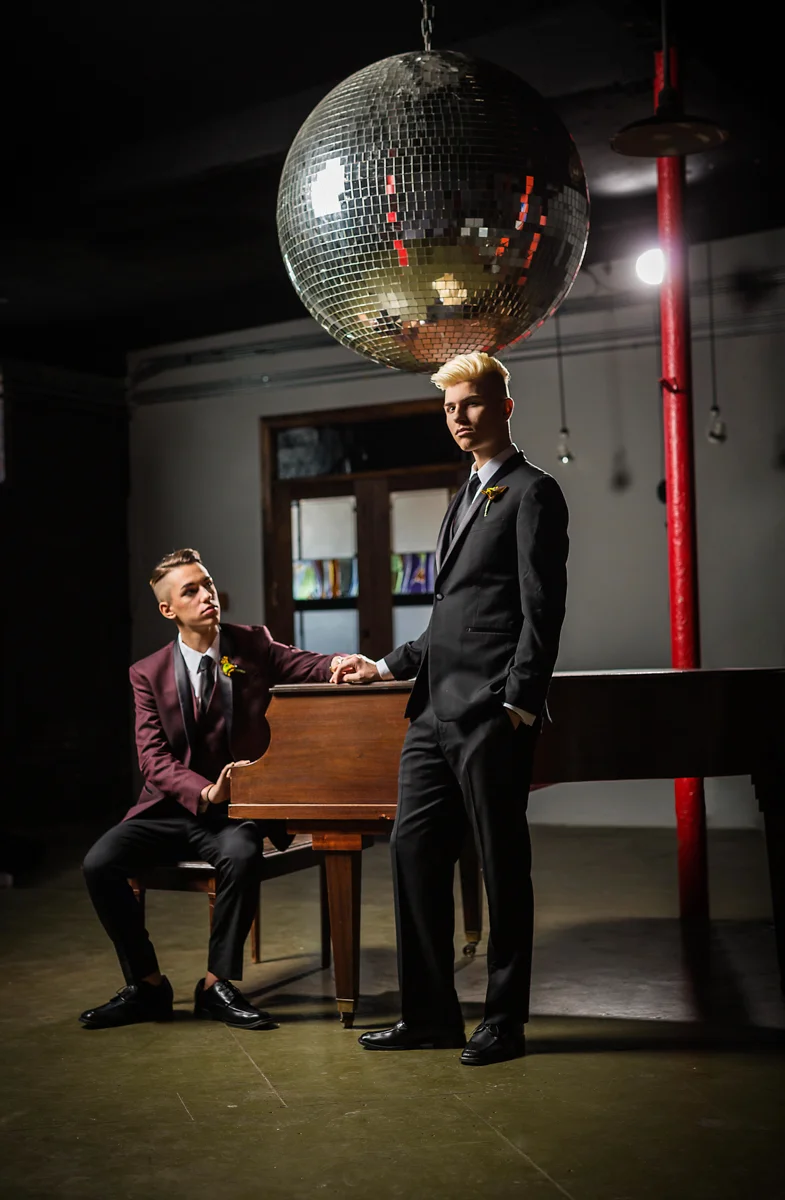same-sex wedding with a disco ball
