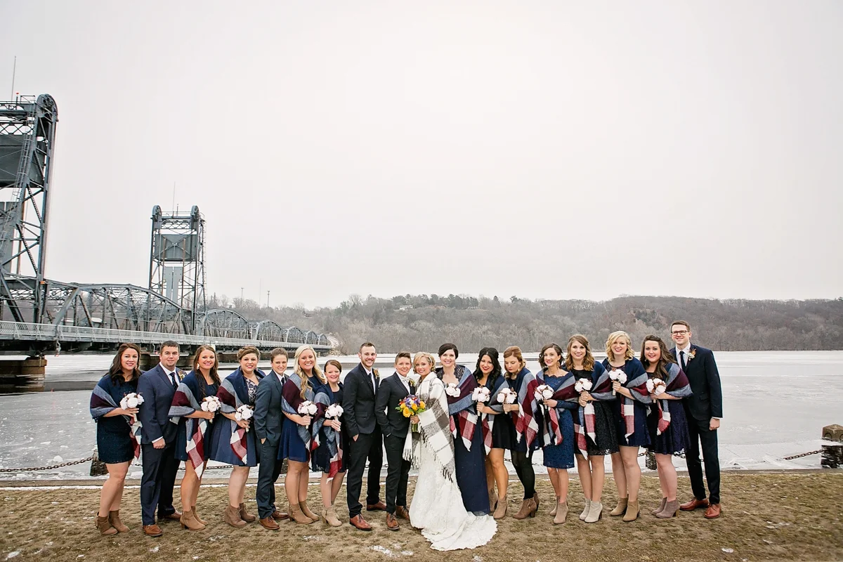 mixed gender bridal party in the winter, with blanket wraps