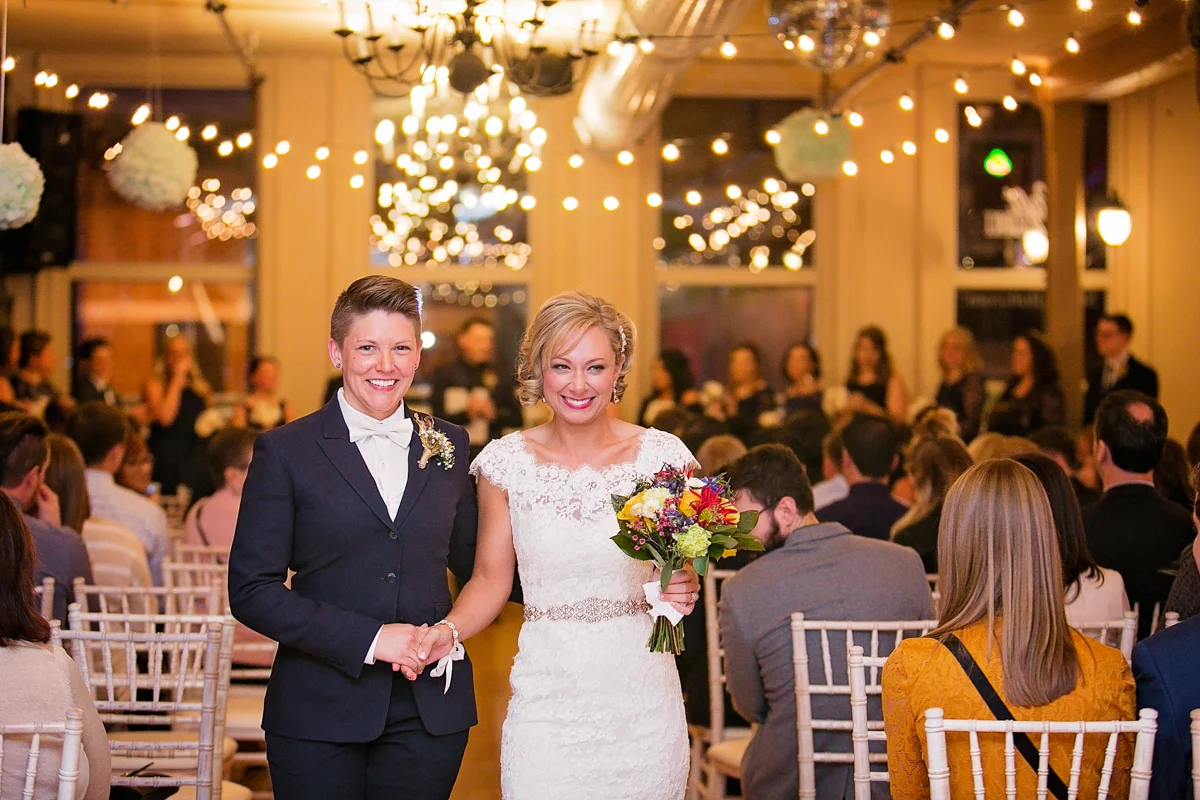 same-sex wedding ceremony at the loft @ studio j in stillwater, mn