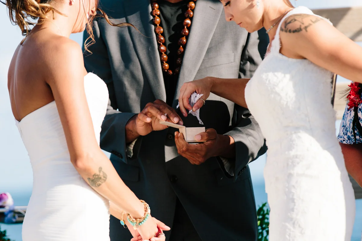 wedding ring exchange on a boat in Hawaii