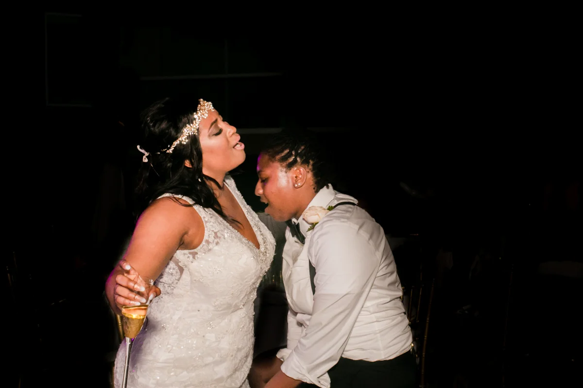 two black brides dancing at their wedding in mexico
