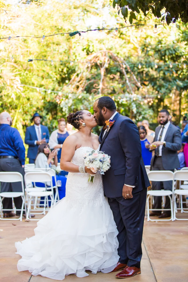 kissing while walking down the aisle