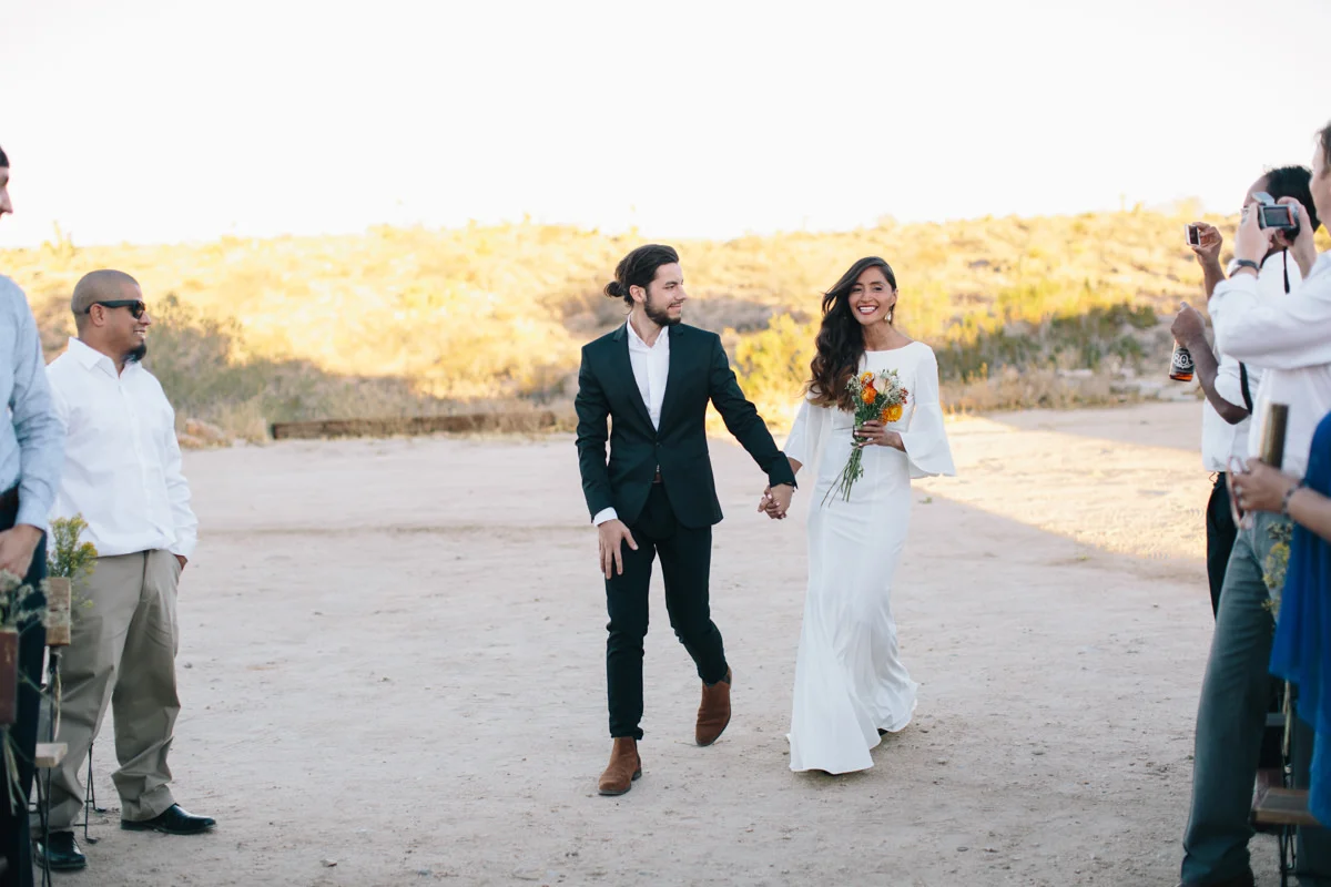 Entering the wedding ceremony together.