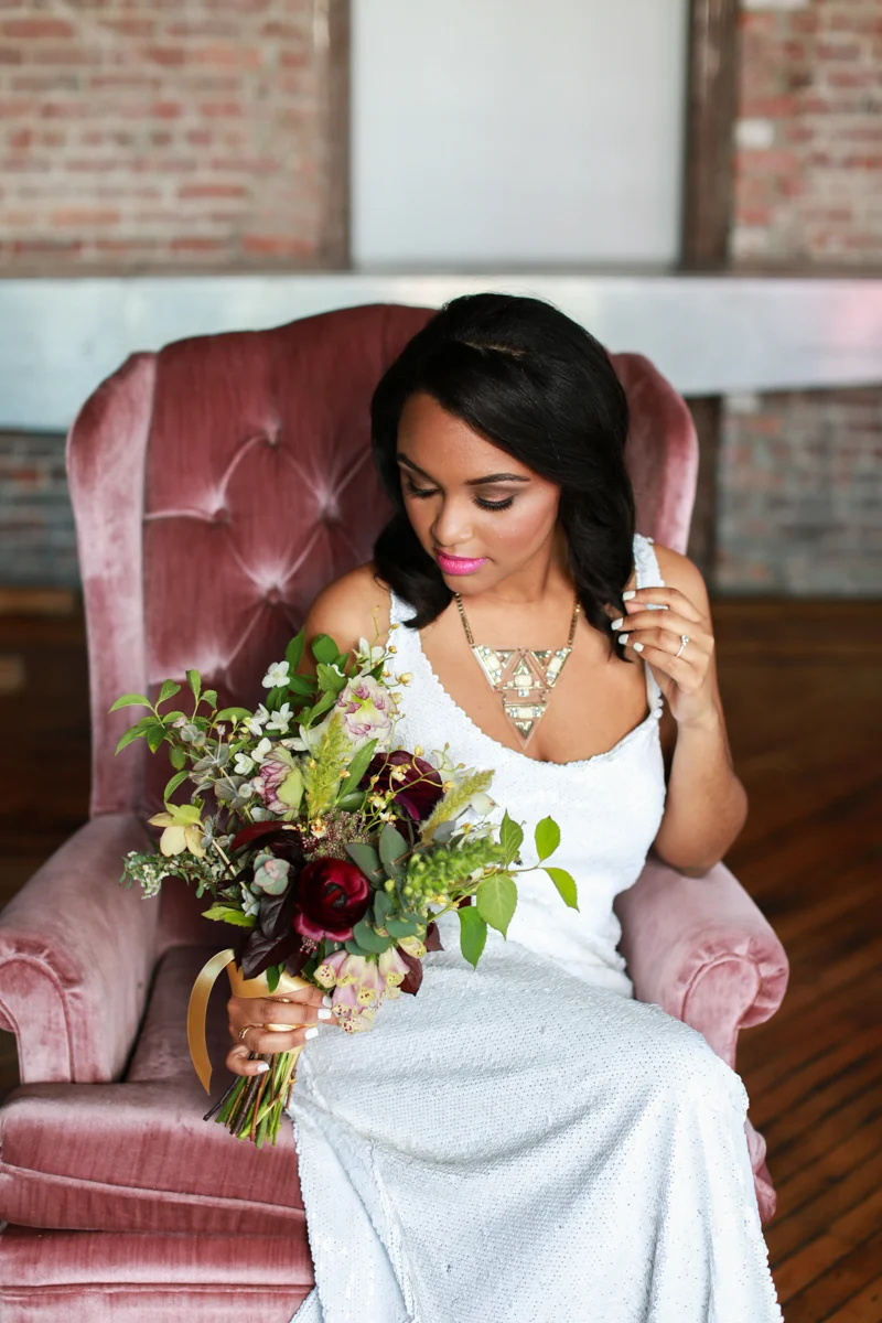 bride holding a late summer bouquet by Hawk & Hare