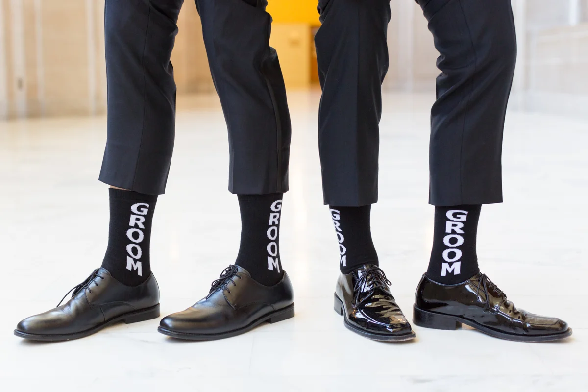 Gay wedding "groom" socks on both grooms