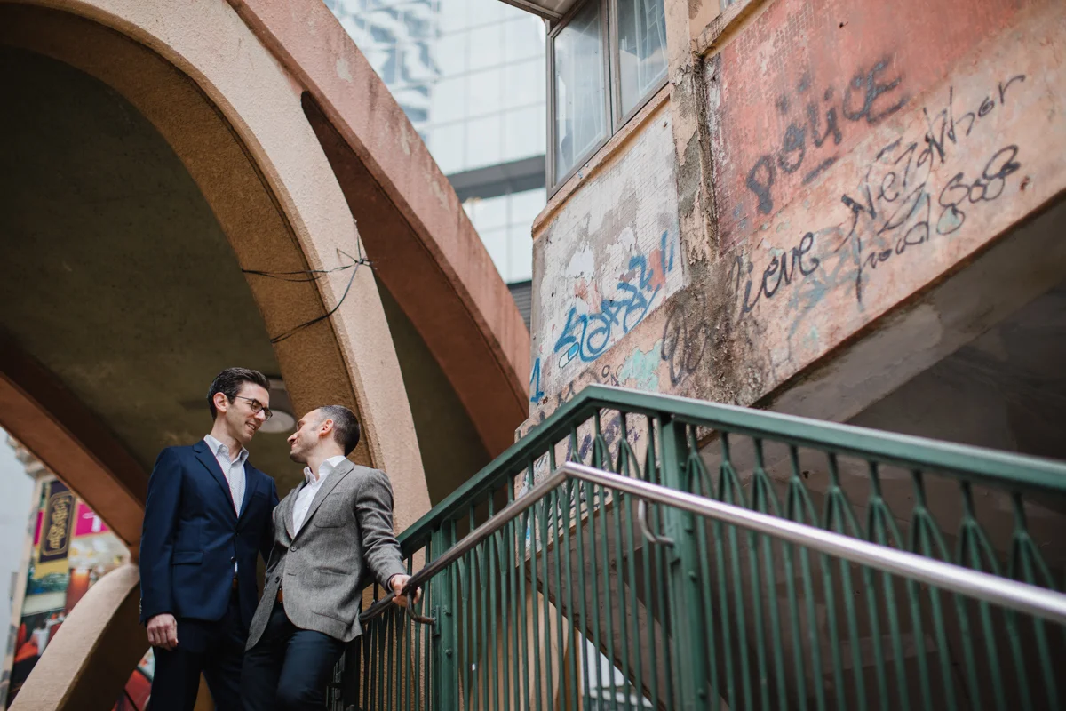 a stairwell in Hong Kong, with graffiti