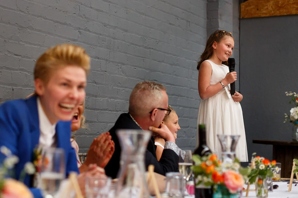 flower girl giving a speech