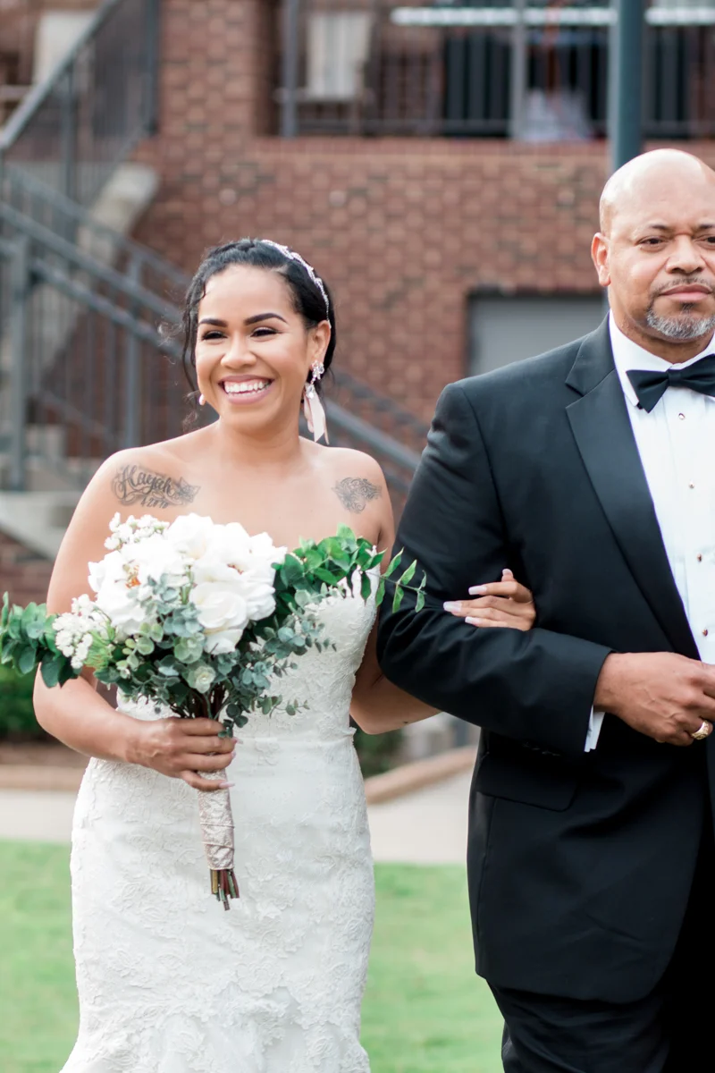 Bride and dad walking down the aisle