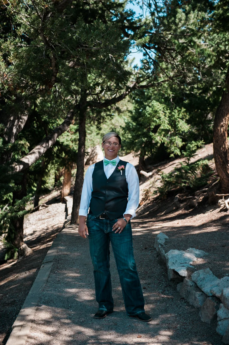 mountain elopement katie posing on path