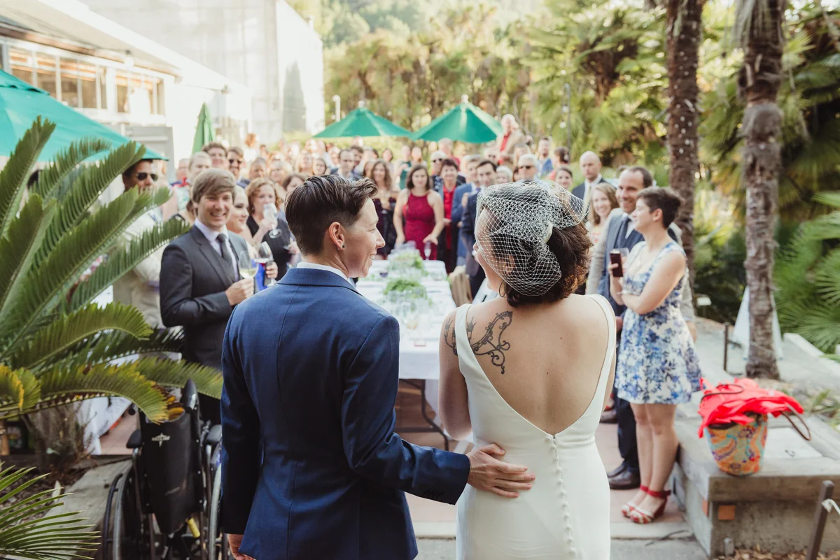 uc berkeley garden wedding couple entering reception