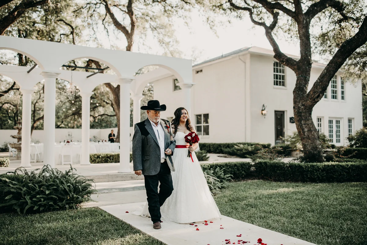 San antonio garden wedding orlando and her father walking down aisle