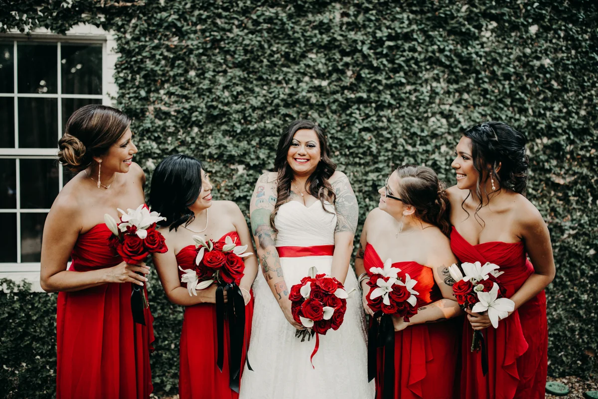 San antonio garden wedding bride between four bridesmaids