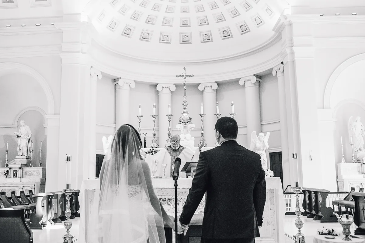 mount vernon ballroom wedding couple holding hands ceremony
