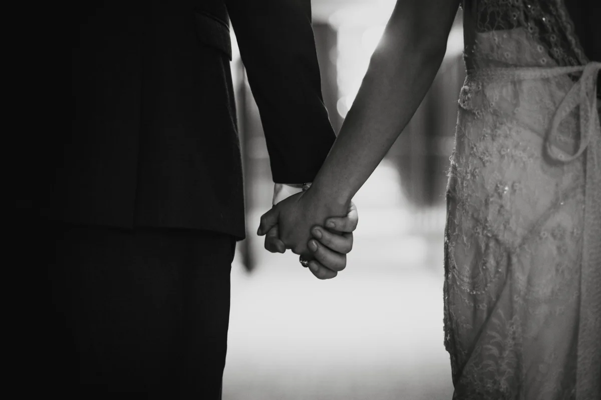 williamsburg hotel wedding shoot couple holding hands close-up