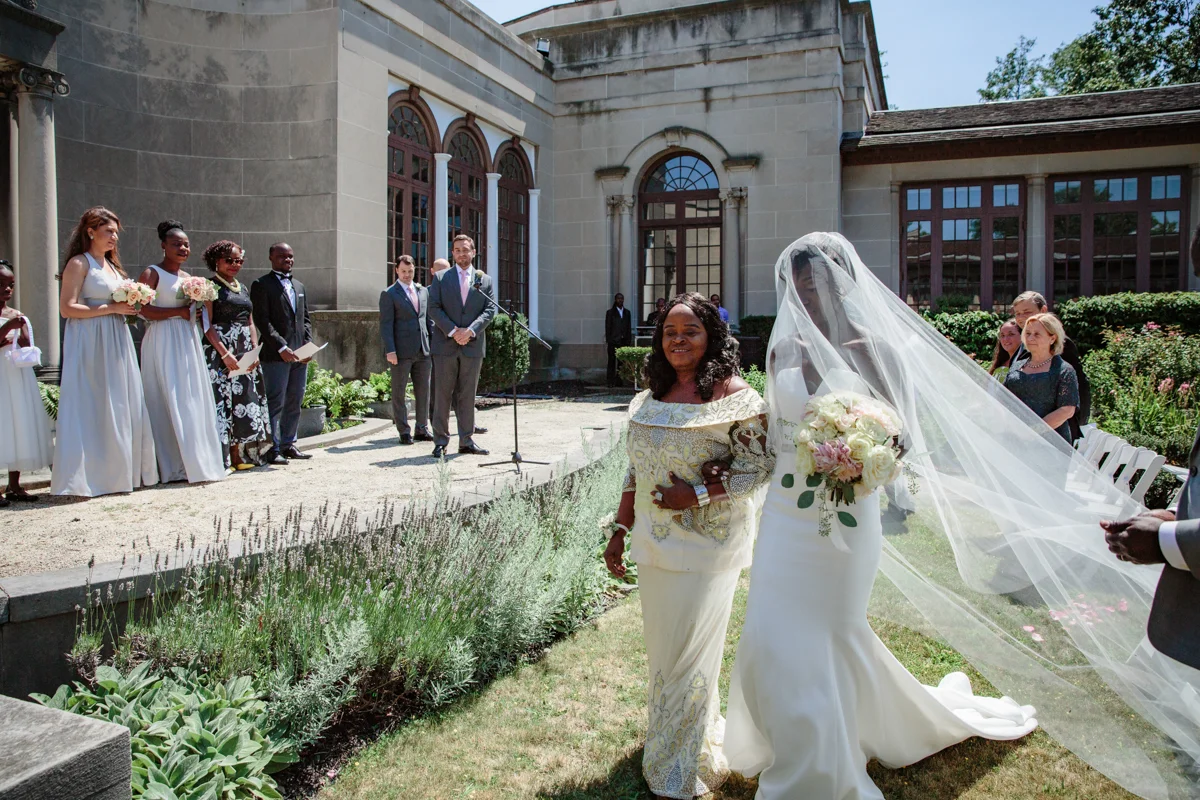 Glam cleveland museum wedding gloria arriving with mother