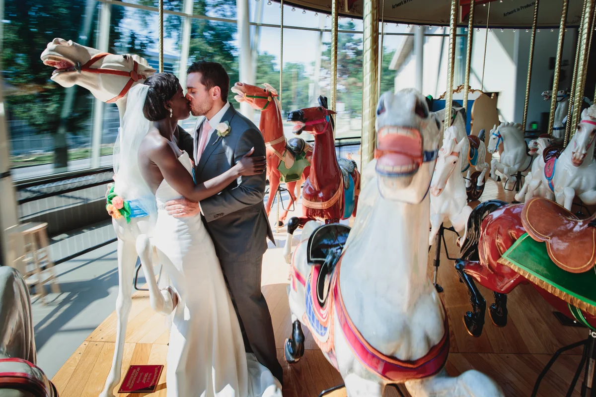 Glam cleveland museum wedding kiss on carousel