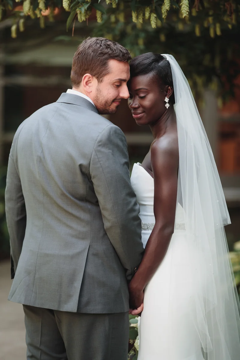 Glam cleveland museum wedding embrace under tree