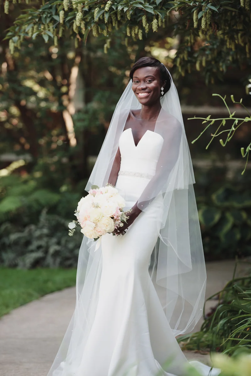 Glam cleveland museum wedding gloria posing on garden path