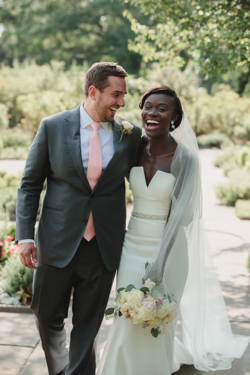Glam cleveland museum wedding couple laughing in garden