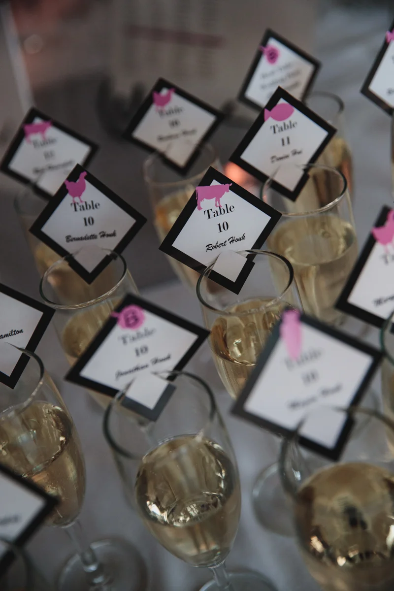 Glam cleveland museum wedding guests' name cards on champagne glasses