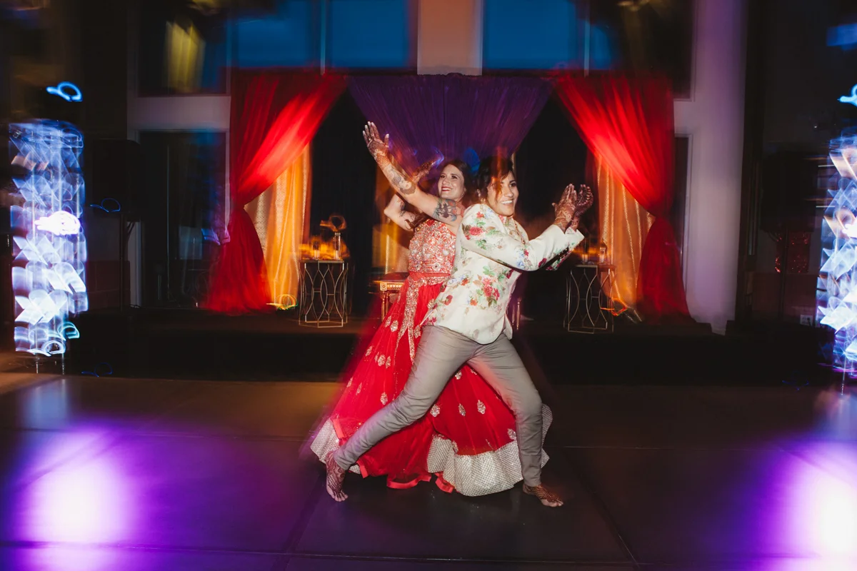 DENVER SAME-SEX INDIAN WEDDING MONICA AND ALBERTINE DANCING