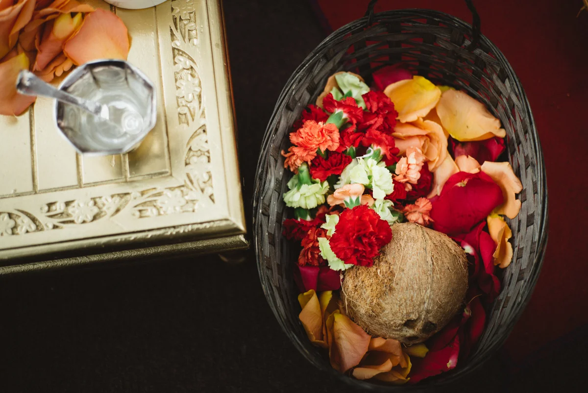 Denver Same-Sex Indian Wedding basket with coconut and flowers inside