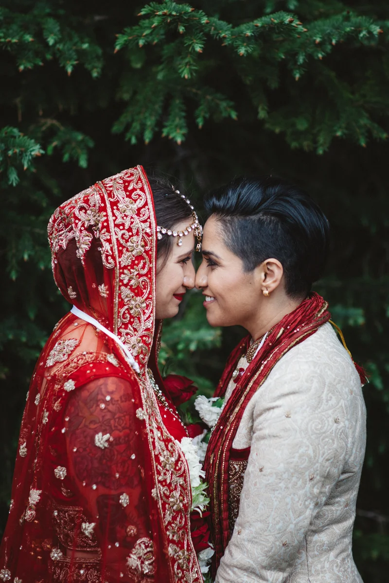denver same-sex indian wedding foreheads touching