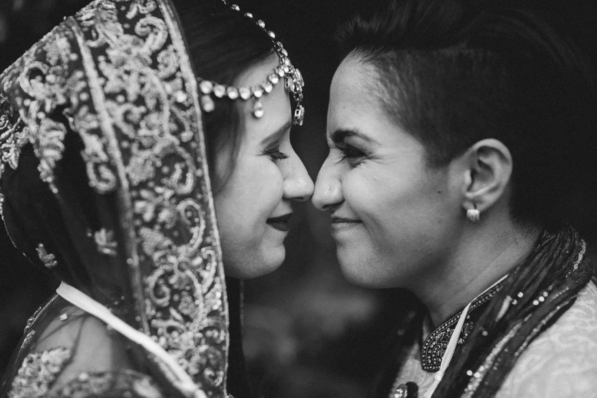 denver same-sex indian wedding eskimo kiss