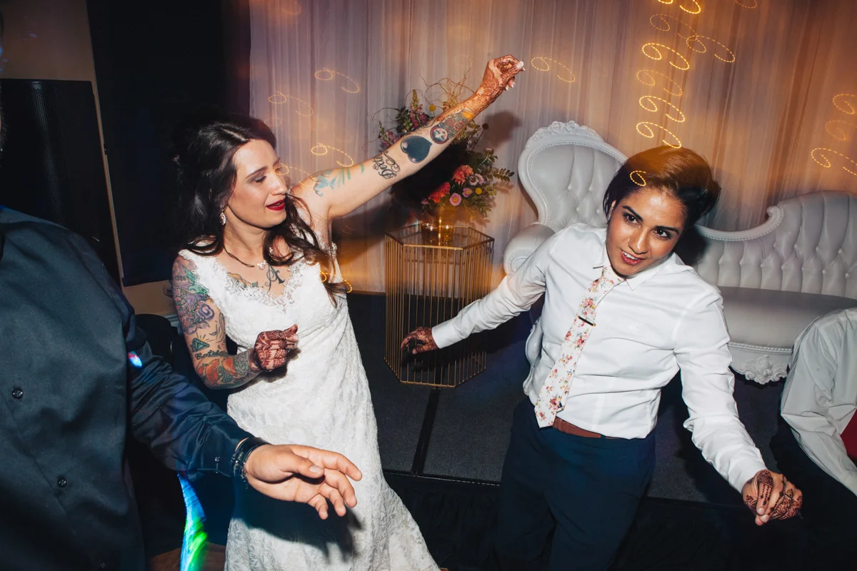 denver same-sex indian wedding couple on dance floor
