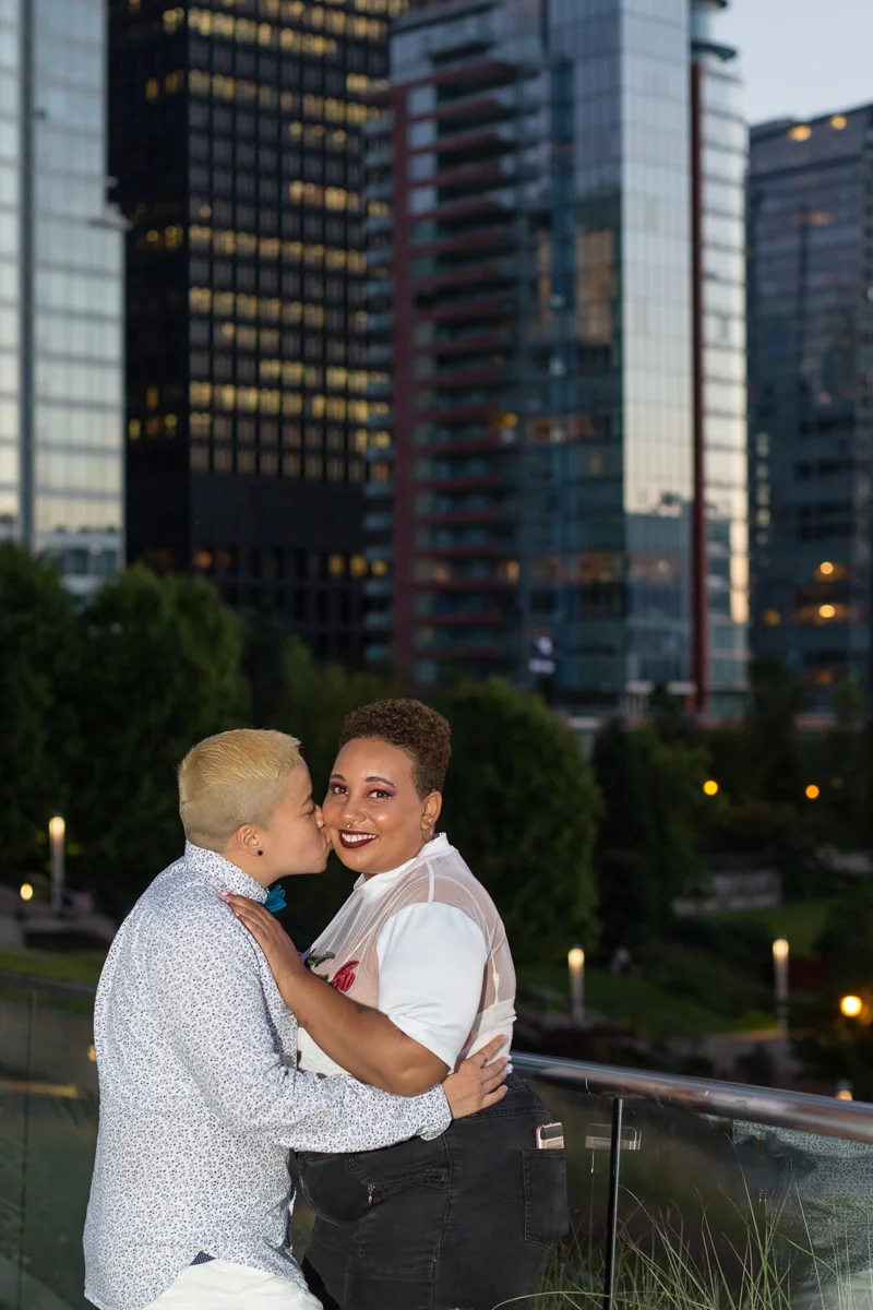 vancouver "just-because" photo shoot ace kissing cicely-belle's cheek on a bridge