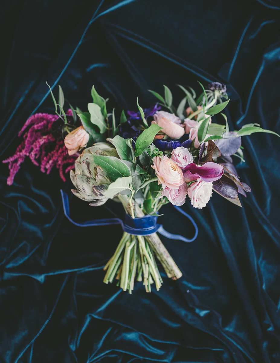 we are young bouquet on velvet backdrop